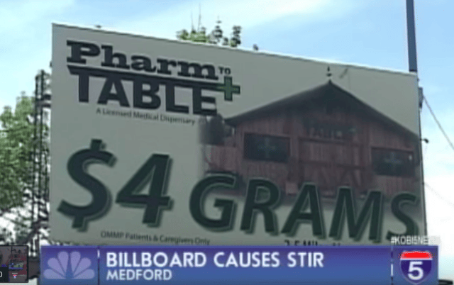 a large white and black sign