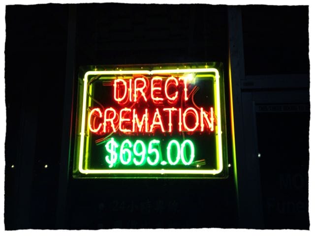 a neon sign with green text