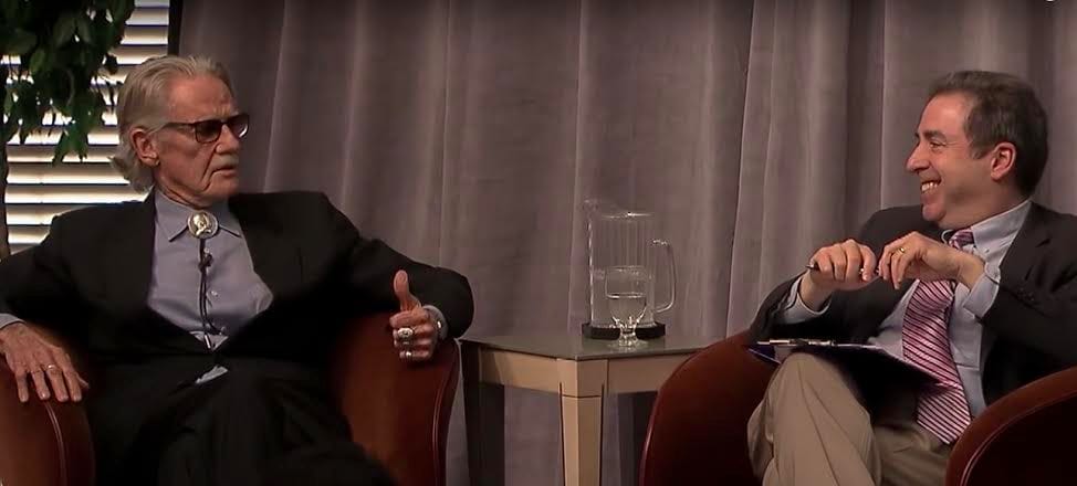 Vernon L. Smith, Russ Roberts are posing for a picture