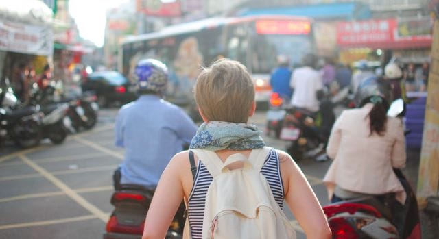 a woman on a motorcycle