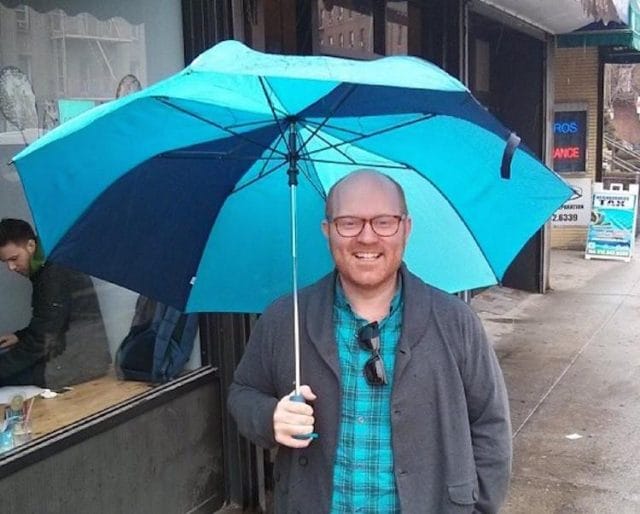 a person holding an umbrella