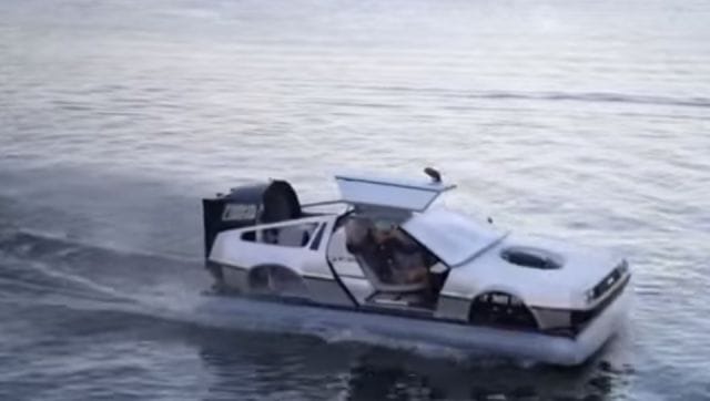 a white car driving on water