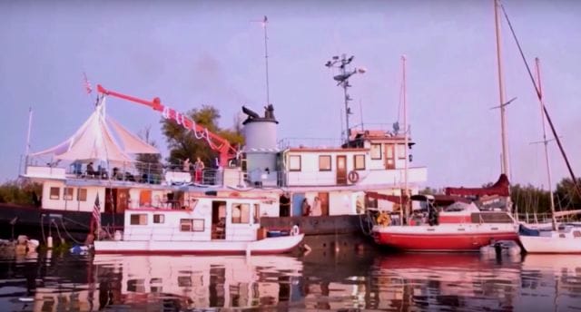 a group of boats in a harbor