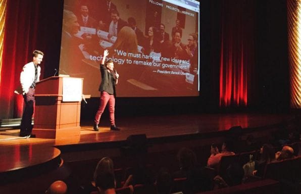 a couple of men on a stage