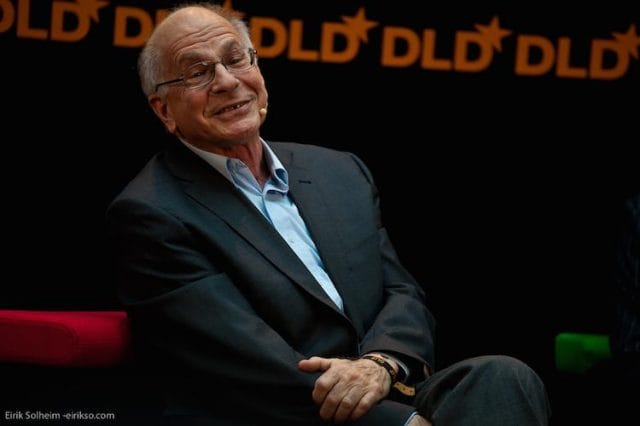 Daniel Kahneman sitting in a chair