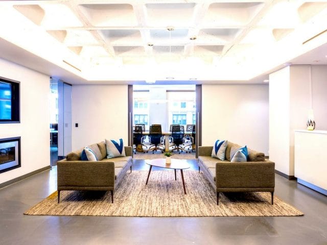 a living room with a large glass door