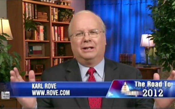 Karl Rove in a suit and tie