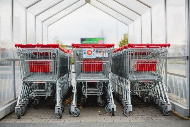 several shopping carts in a warehouse