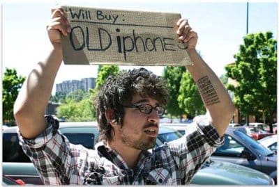 a man holding a sign