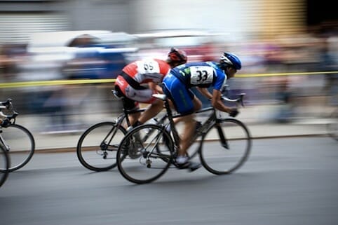 a group of people riding bikes