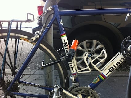 a bicycle with a blue seat