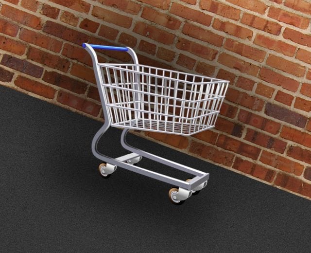 a shopping cart on a sidewalk