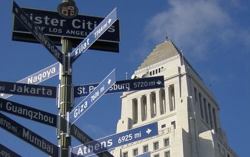 a street sign with several street signs