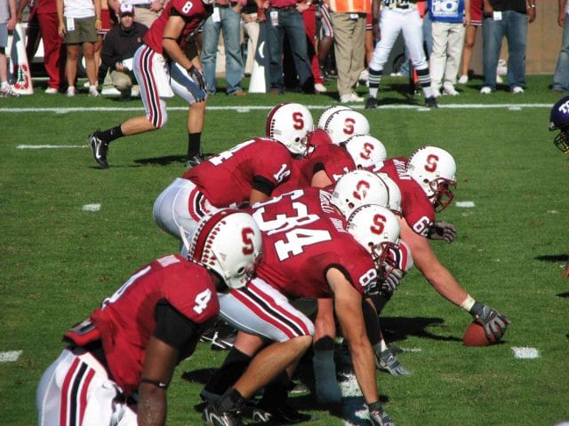 a group of football players on a field