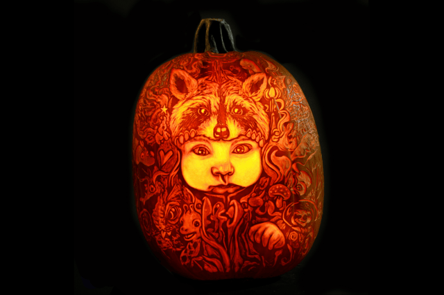 a pumpkin with a face carved in it