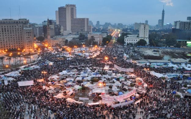 a large crowd of people in a city