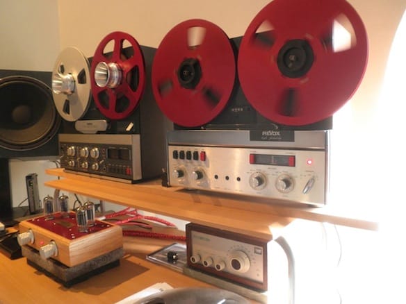 a group of record player's on a table