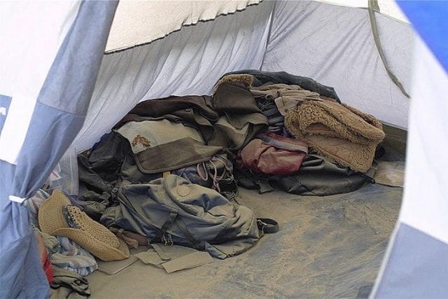 a tent with clothes in it