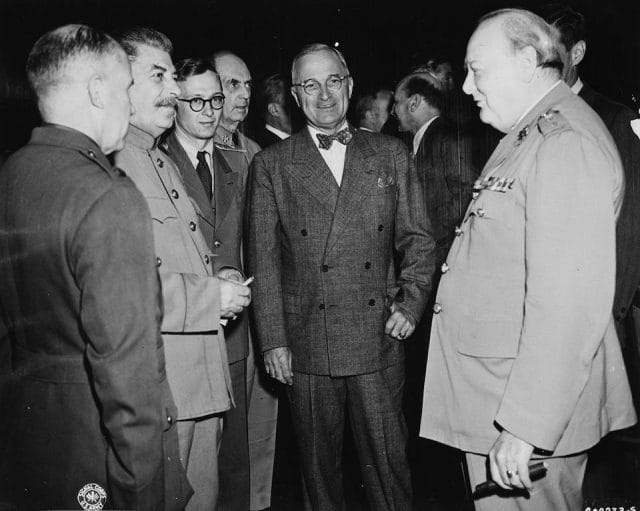 Joseph Stalin, Harry S. Truman, William D. Leahy et al. are posing for a picture