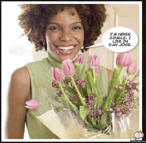Nnenna Freelon holding a bouquet of flowers