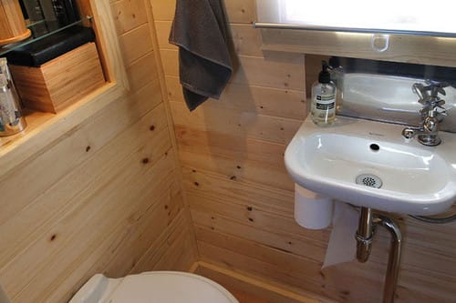 a bathroom with a sink and toilet