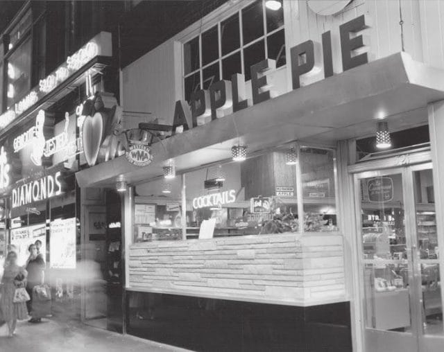 a store front with signs