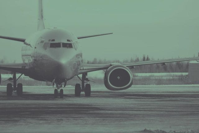 a military plane on the runway