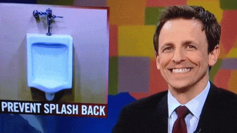 Seth Meyers in a suit and tie