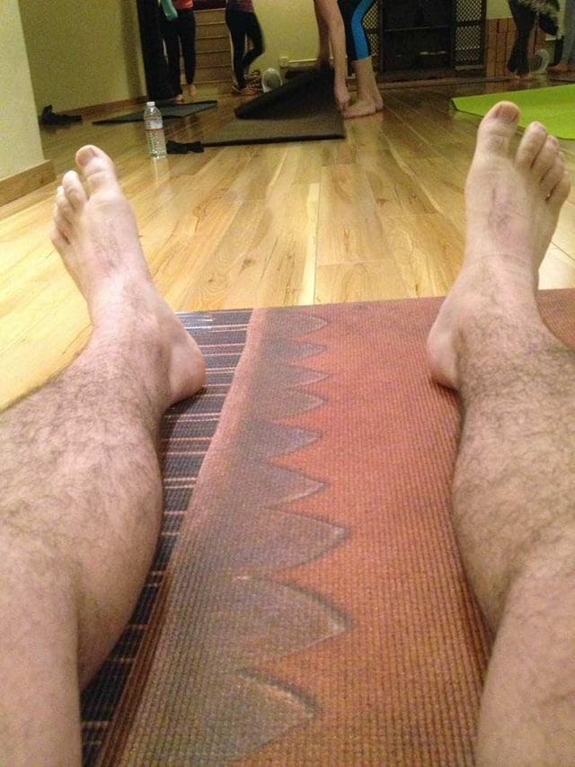a pair of feet on a rug
